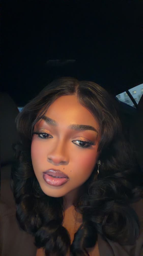 Birthday glam with a cut-crease eye, glitter detail and strip lashes